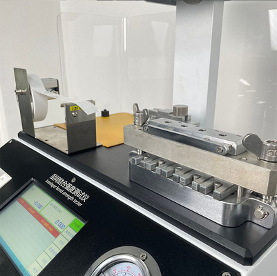 Machine à tester la résistance à la liaison entre les couches de papier et de carton à libération entièrement automatique